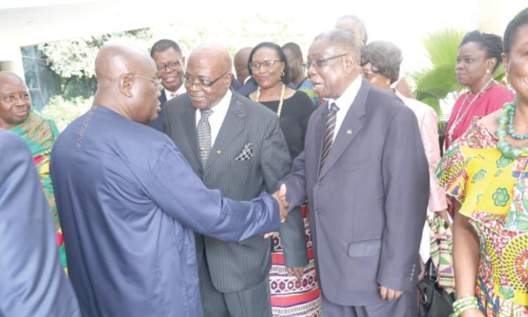 President Akofo-Addo  in a handshake with Ambassador Victor Gbeho